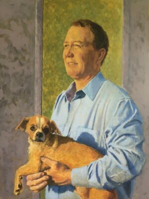 Oil painting of a man in a light blue shirt holding a small, light-brown dog.