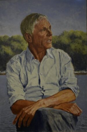 Oil painting of a middle-aged man with gray hair in a button-down shirt sitting outdoors.